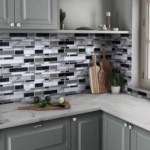 Peel And Stick Backsplash Wallpaper For Kitchen With 3D Look Tile Contact Paper Waterproof No Fuss Easy To Clean Oil Proof Heat Resistant 17.7In X 196.8In 24.22 Sq Ft Roll applied in kitchen with gray cabinets and cutting board.