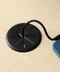 Slick 20 Piece Desk Cable Grommet Kit With Tough Rubber Inner Rings For Ultimate Wire Management And Clean Cord Organizing On Your Workspace Furniture Today. black desk cable grommet on wood surface with cord routing