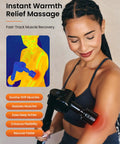 Woman using Heat And Cold Therapy Massage Gun With Deep Tissue Percussion For Muscle And Neck Pain Relief on her arm, smiling.