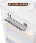 Close-up of 17 Quart Clear Plastic Storage Bins With Latching Lids, showing buckle latch and folded clothes inside.