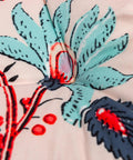 Close-up of blue and red leaves design on 2 Pack Outdoor Indoor Wicker Patio Seat Cushions With Ties For Dining Chairs 17 X 17 Inches.