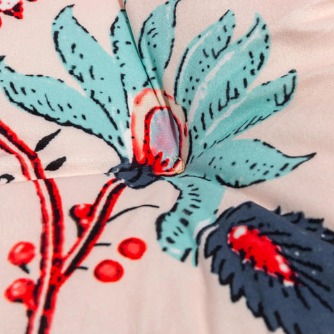 Close-up of blue and red leaves design on 2 Pack Outdoor Indoor Wicker Patio Seat Cushions With Ties For Dining Chairs 17 X 17 Inches.