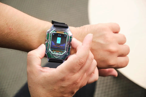Clockstar 2.0 DIY Smartwatch Kit on wrist with clear plastic case, display, and black strap