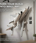 Lego Shuttle Carrier Aircraft 10360 Wall Mount Space Saving Display Bracket mounted on wall beside a potted plant.
