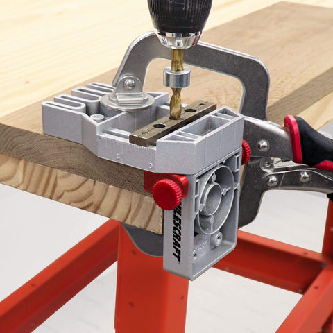 Joint Master Doweling Jig with self-clamping aluminum frame for edge, corner, and surface joints, includes centering spacers and retractable edge stops that auto align, works with 1/4in, 5/16in, and 3/8in dowel pins