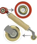 Welding handheld roller with red 40mm silicone seam wheel, brass detail, wooden handle; bearing close-up.