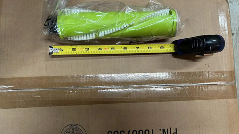 Replacement Brush Roll Assembly For 3339 Slim Vacuum in packaging next to measuring tape for size reference.