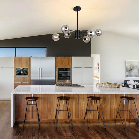 Six Light Black Glass Globe Sputnik Chandelier For Dining Room And Living Room installed over modern kitchen island