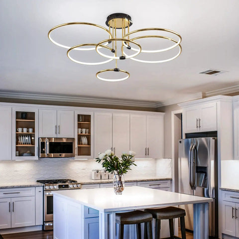 Dimmable 90W LED Ceiling Chandelier With Remote Control, Dope Gold Six Ring Flush Mount Light Fixture For Living Room, Kitchen, Bedroom, 3000K-6000K, 41.3 Inch installed in a modern kitchen.