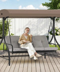Person sitting on a swing chair with Porch Swing Canopy Top Replacement For Outdoor GCS00229C Beige Shade Cover Direct Fit
