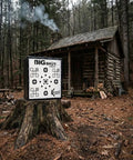 Iron Man 20 Kinetic Archery Target on stump in forest, 20x20x14 inches, featuring 95 shooting spots.