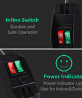 Close-up of two-way outdoor extension cord with independent on/off switches, showing red and green switch indicators.