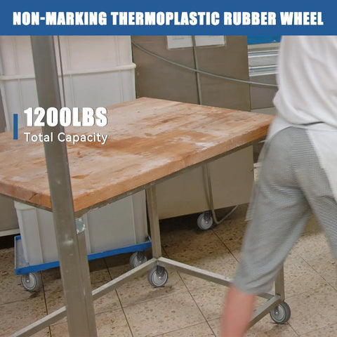 Rock Solid Workhorse 4 Inch Stainless Steel Casters Jam Packed With Thermoplastic Rubber Wheels For Heavy Duty Labor In Labs Or Shops Handles Up To 1200 Lbs in use with a wooden table.