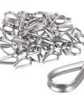 50 Pack Heavy Duty Stainless Steel Wire Rope Thimbles 1/16 Inch Cable Sleeves For Marine Rigging Fence And Sail Tensioning Built Rock Solid Rust Proof Weekend Warrior Kit, shiny stainless steel thimbles stacked.