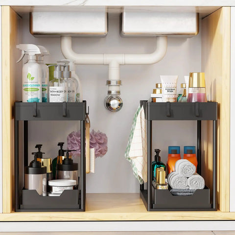 Smooth Pullout Under Sink Organizer Two Pack Heavy Duty Metal Rack For Kitchen And Bathroom Big Stack Zero Clutter Solid Setup Storage Game Changer In Black, showcasing dual metal racks holding cleaning supplies and toiletries.