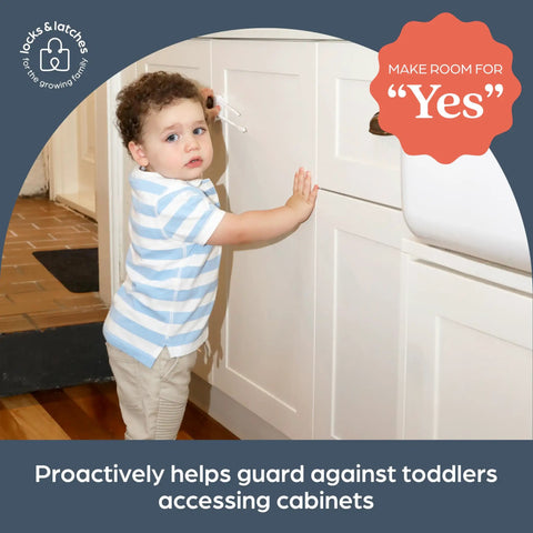 Toddler near cabinet with Sliding Cabinet Locks 3 Pack White For Kid Safe Latches Easy Install Childproof Locks for safety