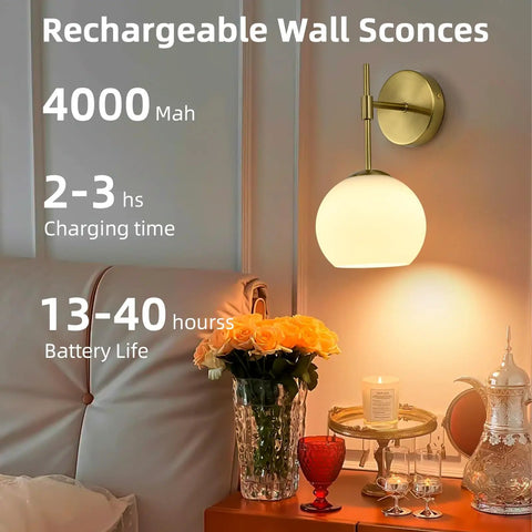 Battery Operated Wall Sconces Set Of Two Rechargeable Gold Milk Glass Wireless Lighting with ambient glow beside roses.