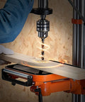 Built Different 12 Inch Benchtop Drill Press With Beefy 5 Amp Motor And Variable Speed Control drilling wood with laser guide.