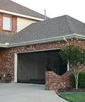 Garage entrance for Garage Screen 16 Ft By 8 Ft With Zipper Door And Storage Kit, showcasing open space for setup.
