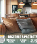 The Real Deal Leather And Furniture Repair Salve Polisher With Deep Conditioner That Brings Beat Up Surfaces Back To Life And Keeps Your Ride Looking Crisp For Cars Couches Boots 8 Oz on a couch with decorative pillows.