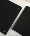 Top Tier 24 Pack Chicago Screws Featuring Phillips Heads Rust Resistant 304 Stainless Steel Binding Rivets on black leather photo albums.
