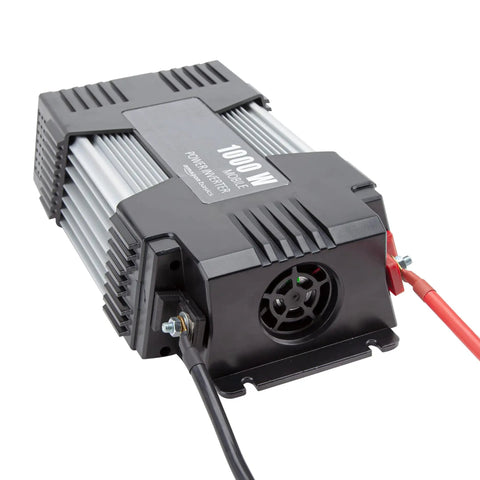 Rock Solid 1000W Car Power Inverter converting 12V to 110V AC, showing durable gray body and connecting wires.