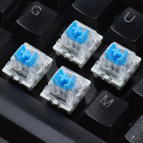 Blue Clicky 3 Pin Mechanical Keyboard Switches Set For Gaming Keyboards, Dustproof 45 Pack, 50gf Actuation, 2.2mm Point, 4mm Travel, Crisp Tactile Feedback, Replacement Keys For Fast Typing And Gaming. Transparent blue switch tops on black keyboard