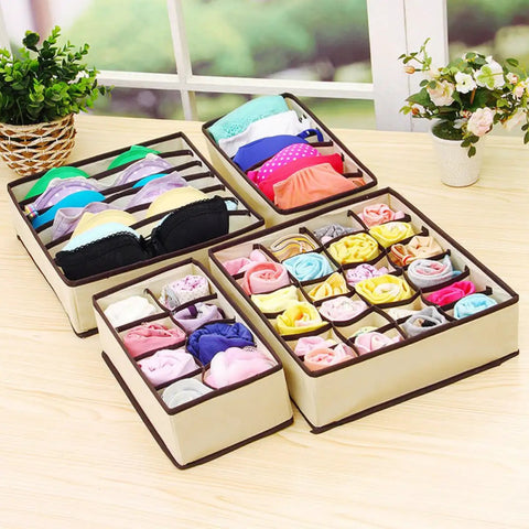 Top Tier Nonwoven Bra And Underwear Storage Boxes Four Piece Set Ideal Closet Drawer Organizer For Women To Keep Your Stash Lowkey Neat And Super Handy, arranged with bras and organized socks.