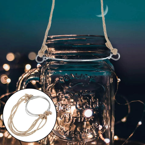 5 Pcs Metal Jar Handles And Wire Hangers For Mason Jars With Universal Hemp Rope Easy To Attach No Tools Required showcased with lights.
