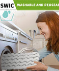 Woman placing 4 Pack Dirt Grip Microfiber Replacement Pads in washing machine, compatible with S1000 Series steam mop, washable and reusable.