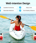 Woman paddling kayak with Portable Kayak Stabilizer With Detachable Outriggers For Canoes And Inflatable Boats, quick release buttons.