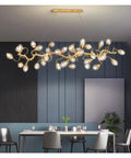 Dope Gold Alloy Pendant Lights For Modern Dining Rooms And Kitchen Islands versatile ceiling hanging fixture illuminating a dining table.