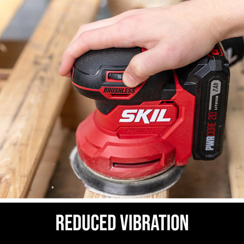Cordless 20 Volt Brushless Random Orbital Sander Kit With 2 Amp Battery Charger Dust Bag And Sandpaper Packs in use, highlighting reduced vibration feature.