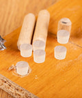 Tapered Wood Plugs For Screw Holes With Button Plug Head, Lightweight Furniture Repair Caps shown on a wooden board