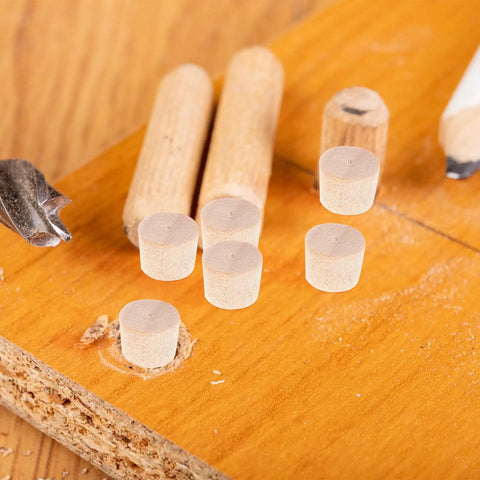Tapered Wood Plugs For Screw Holes With Button Plug Head, Lightweight Furniture Repair Caps shown on a wooden board