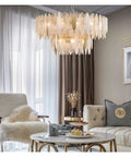 Slick Two Layer Led Chandelier Built With Solid Metal And Frosted Glass Panels in modern living room setting.