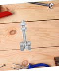 Built Like A Tank Stainless Steel Sliding Door Hanger With Double Bearing Track Rollers on wooden surface with tools.