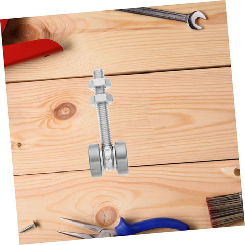 Built Like A Tank Stainless Steel Sliding Door Hanger With Double Bearing Track Rollers on wooden surface with tools.