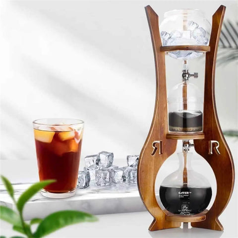 Portable Cold Brew Drip Tower With Smooth Flow Dial And Hefty 1000 Milliliter Pitcher For Chilling Bold Iced Coffee Creations And Nitro Blends displayed with iced coffee.