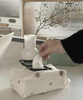 Hand taking wipe from Compact Wet Wipe Organizer For Diapers And On The Go Essentials Lightweight Reusable Travel Case