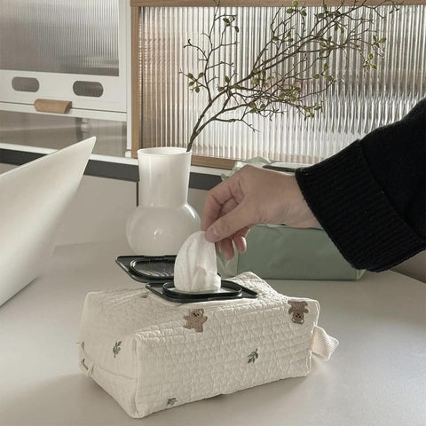Hand taking wipe from Compact Wet Wipe Organizer For Diapers And On The Go Essentials Lightweight Reusable Travel Case