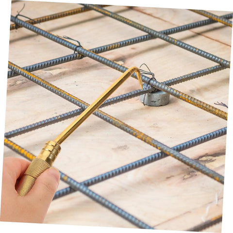 Portable Tie Tool With Hook For Quick Fence Tying On Job Sites Pro Grade Wire Twisting Tool With Textured Grip in use on metal grid