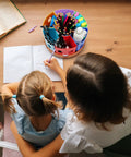 Rotating Art Supply Storage Organizer With 360 Degree Spin Base Kid Friendly Craft Caddy on table while child draws.