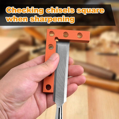 Mini Center Finder Tool 90 Degree Precision Machinist Square in orange, checking a chisel's squareness during sharpening.