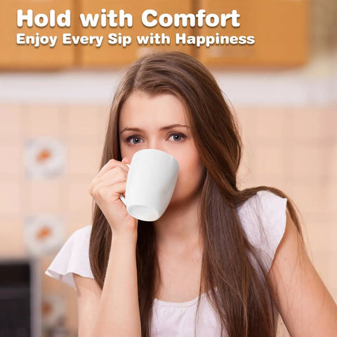 Woman holding a mug from Huge 16 Ounce Ceramic Coffee Mugs 4 Pack White Set Durable Stoneware Cups For Coffee Tea Heat Retention