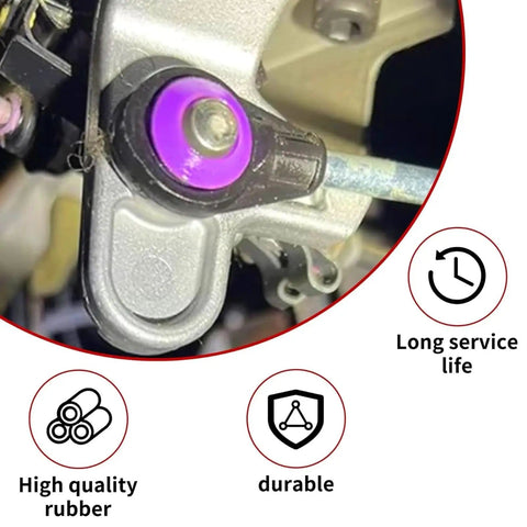 Close-up of 2Piece Transmission Shift Cable Bushing Kit showing purple bushing installed on vehicle gear selector mechanism.