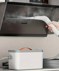 Premium Handheld Steam Cleaner For Crushing Gnarly Messes Off Tile Floors Kitchen Counters Car Interiors And Stubborn Bathroom Residue Quick Heat Up White in use for kitchen cleaning.