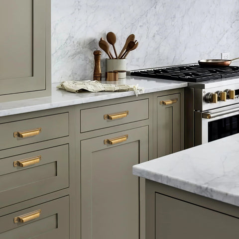Antique Brass Cabinet Drawer Pulls 10 Pack Zinc Alloy Cup Pulls installed in modern kitchen cabinets and drawers