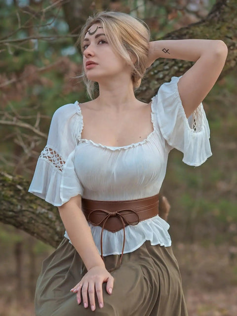 Dope Renaissance Obi Belt With Snatched Medieval Leather Corset Style Game Changing Wide Cinch Strap worn with white top and skirt.