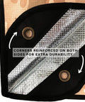Corner detail of All Weather Survival Blanket With Reflective Heat, Camp Ready Emergency Tarp, desert camo, reinforced grommets.
